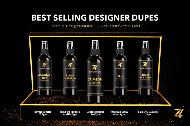 Five sleek black spray bottles with gold lettering labeled as designer inspired best perfume oils including baccarat rouge and tobacco vanille
